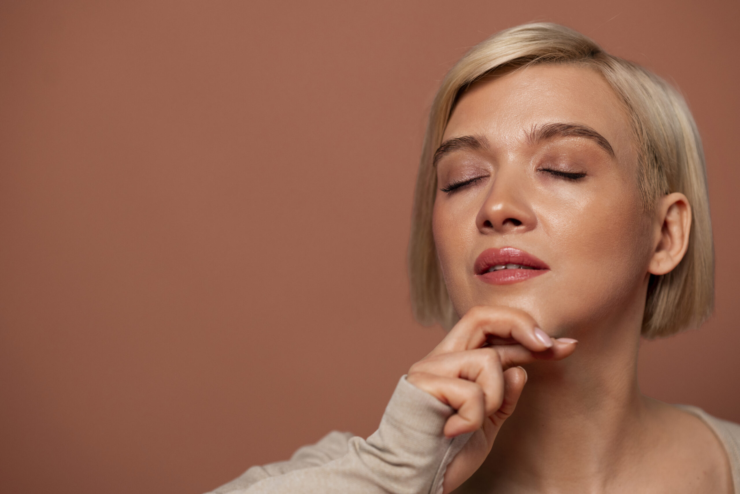 front view woman practicing facial yoga scaled